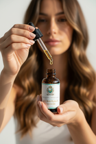 Woman with Auric Melt Hydra-C Concentrate vitamin C serum